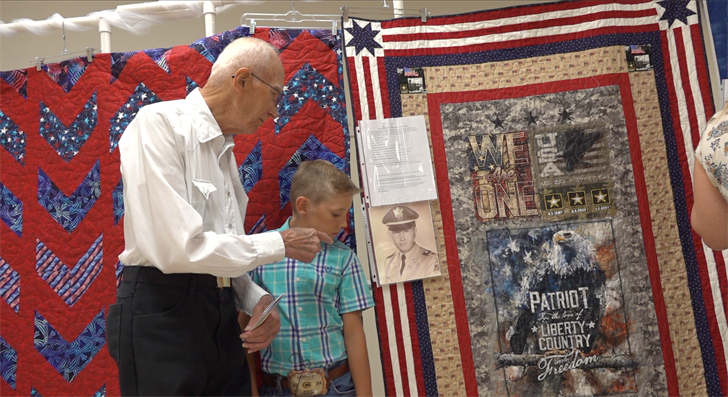 Patriotism in every stitch: Cherry County 4-Hers sew quilts for veterans